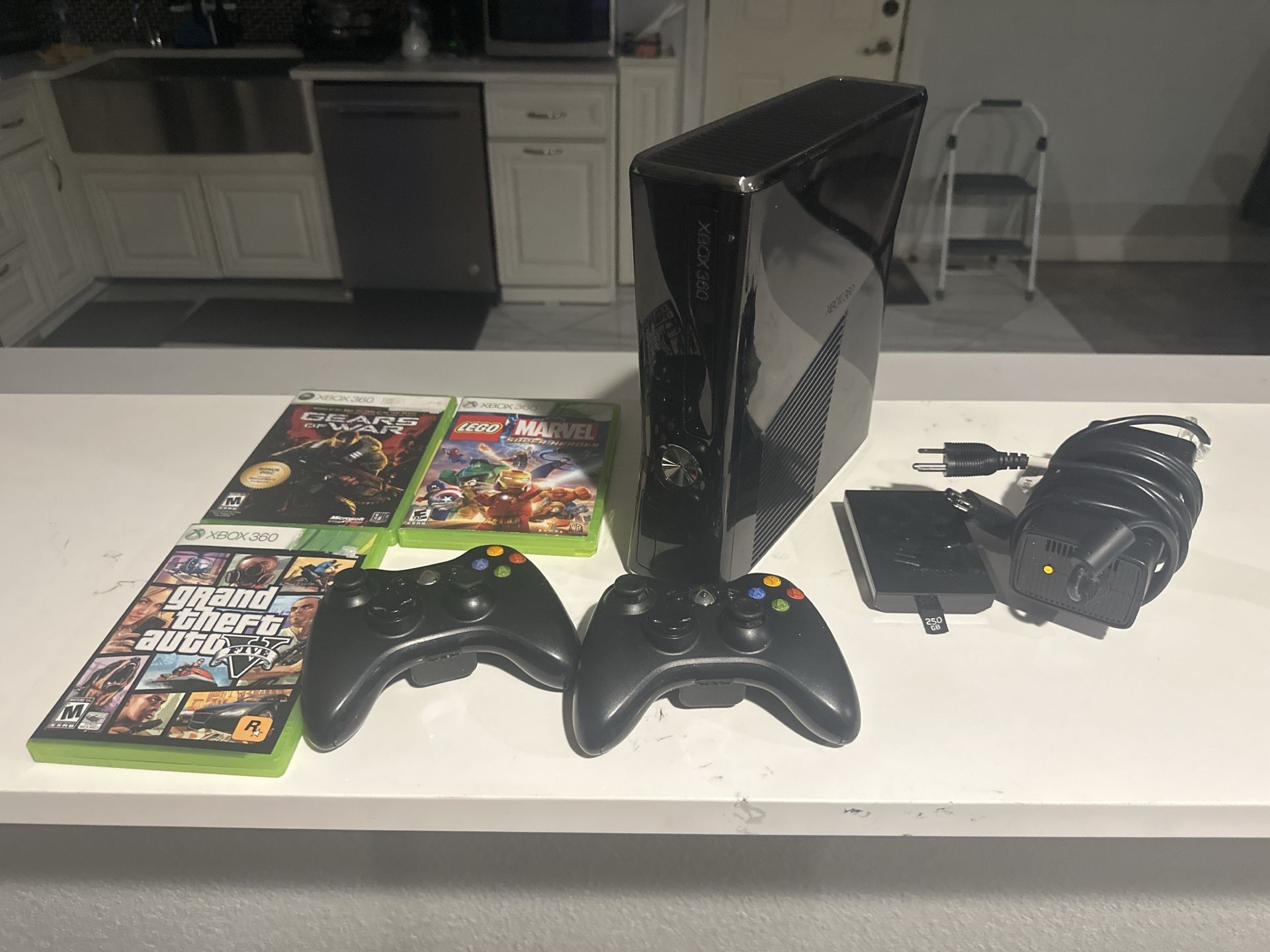 Xbox 360 Slim w/ 250GB HDD, 2 Controllers, 3 Games – Great Condition!