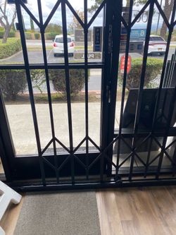 Store front security gate