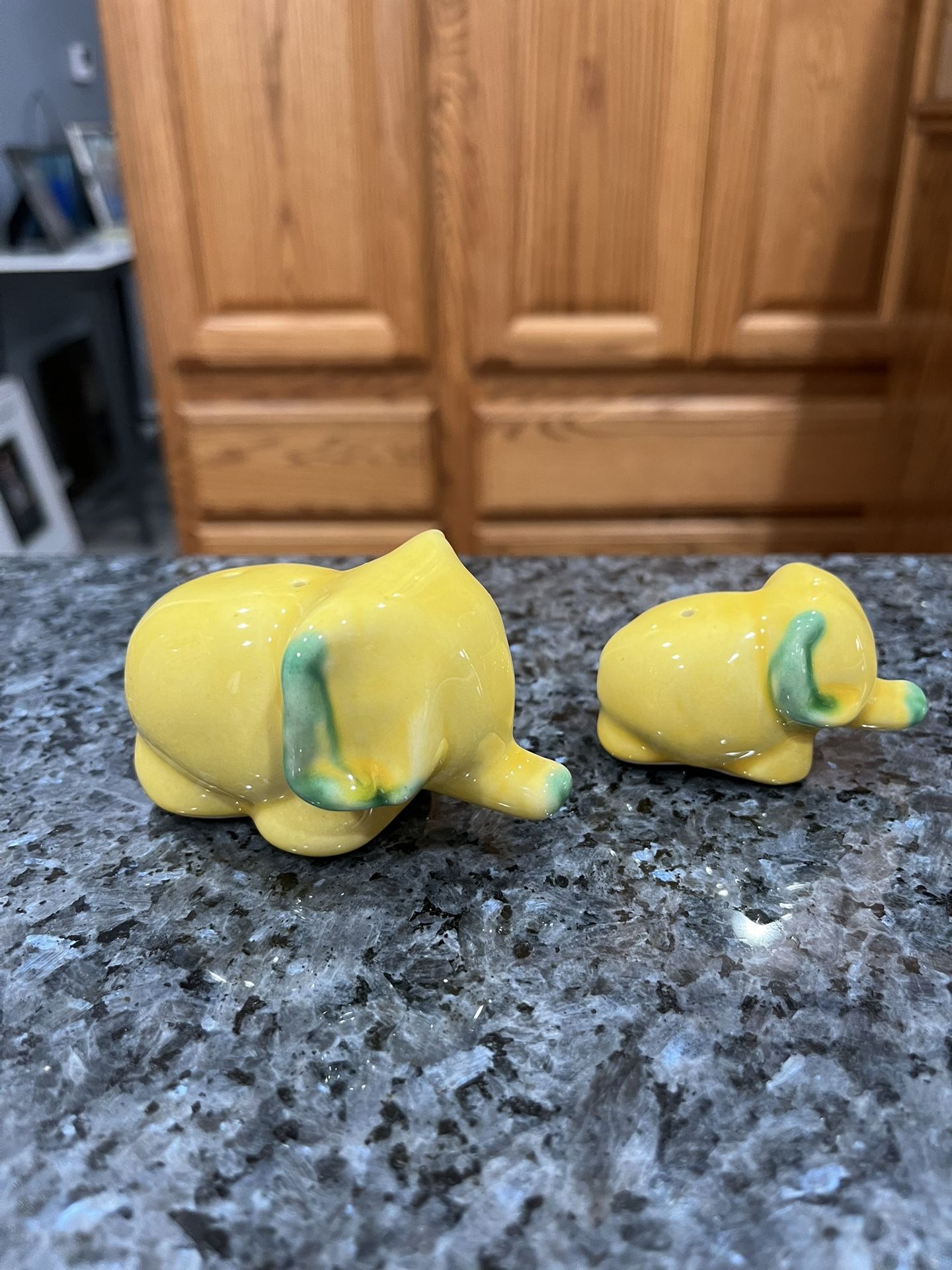 Vintage Ceramic Yellow and Green Elephants pair of Salt and Pepper Shakers. Preowned No Stoppers
