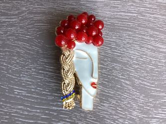 Unique Classic White Enamel Abstract Woman’s Face W/ Golden Braid & A Garnet & Red Headpiece