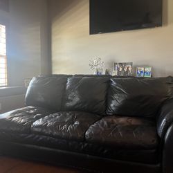 LEATHER LOVE SEAT/COUCH FROM COSTCO