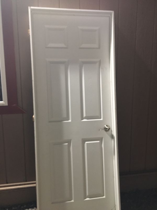 Quantity 6. White interior six panel doors with door handles and door