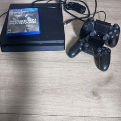 PS4 Slim 1TB, Cables, 2 controllers & 1 game 