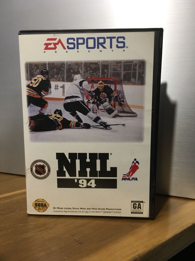 NHL 94 Sega Genesis game (complete in box featuring NHL 96 poster