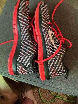 Red Nike shoes size eight