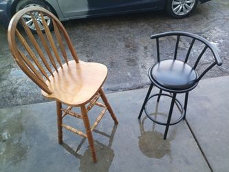 3 wooden chairs  1  black chairs