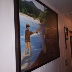 Son And Father Fishing