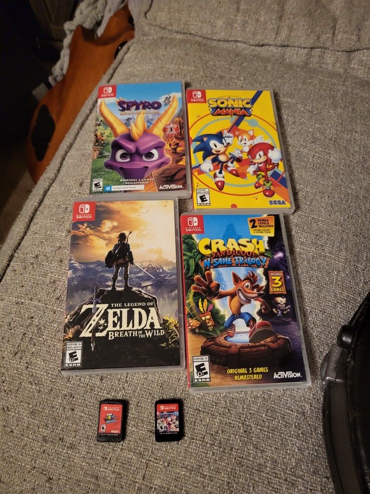 6 Nintendo switch games Mario kart 8, Mario odyssey, sonic, Zelda breath, Crash Bandicoot, spyro
