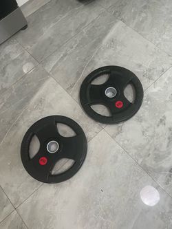 Cash only no zelle new pair of 35lb Olympic weights plates total 70lb urethane rubber material no slip weights have more pairs available