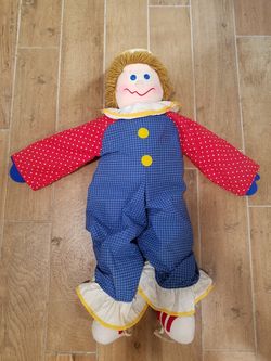 Dancing Clown he is 36 in tall he has straps on the bottom of his feet to wrap around your child's foot your child can walk and dance with him