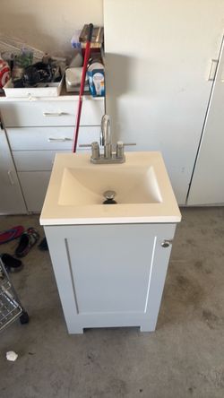 Sink with smalls vanity as is