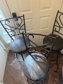 3-Heavy brown bar stools