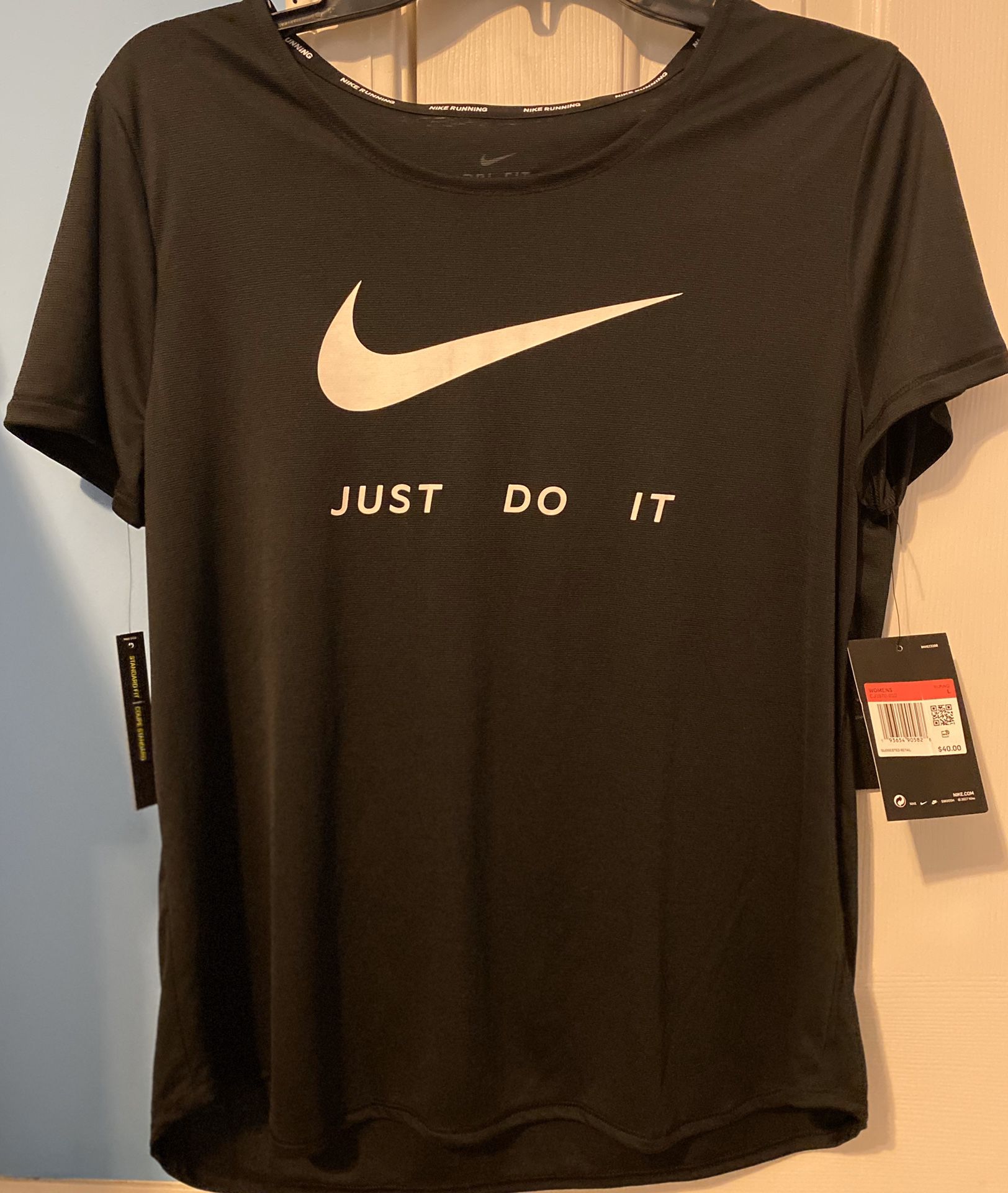 NWT Nike running dri fit women’s short sleeve shirt Large