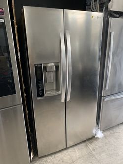 LG side by side in stainless steel with ice and water on door