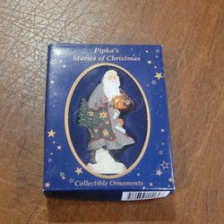 Pipka’s Stories Of Christmas Collectible Ornament 11405 Ukranian Santa 
New in the box. Approximately 4" tall. UPC 57.
Weight 4oz plus shipp