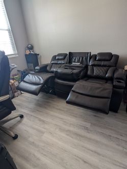 Recling Leather Couch by Ashley