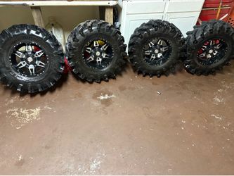 Polaris mud tires  an rims out&back max