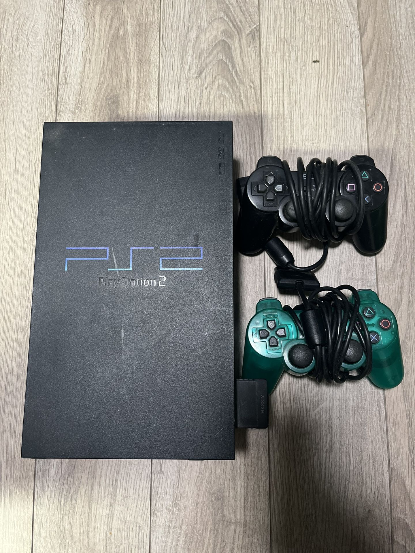 PS2 W / 2 Controllers ( NO CORDS ) ( MAKE OFFER)