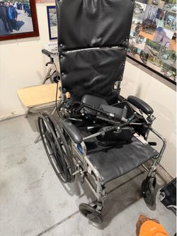 Wheel chair with accessories