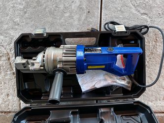 New electric rebar cutter model RC-16. Has 110V, 900W power, max punch diameter 16mm. Includes hard case, power cord, gloves, wrenches, and lubricant 