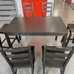 Sleek black Wooden Dining set 