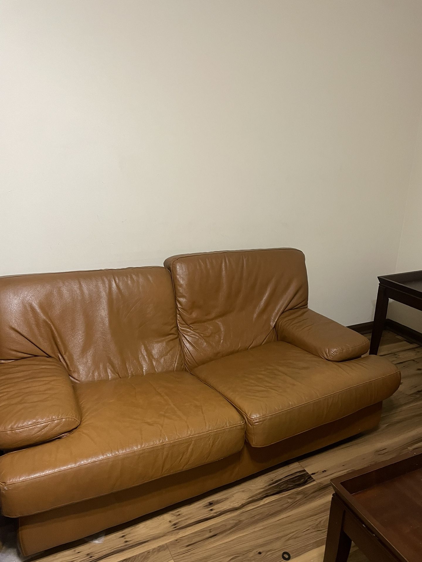 Two Brown Leather Couches +coffee Table(s)