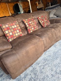 Design by Ashley Brown Faux Leather Upholstery Reclining Sofa