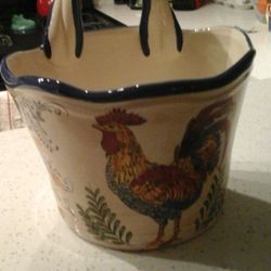 Brand new ceramic plant holder with rooster on front. Price reduced !
