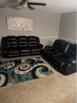 Black recliner sofa