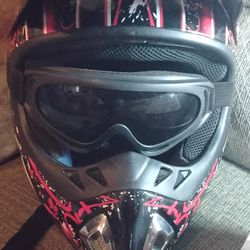 Red dirtbike helmet size small with goggles included