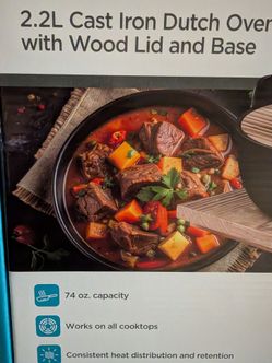 Cast iron Dutch oven with lid ( new in box )