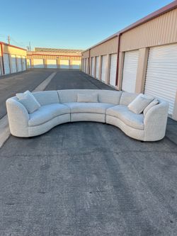 Living Spaces Ivria grey Bouclè curved sectional ( can deliver for $10 )