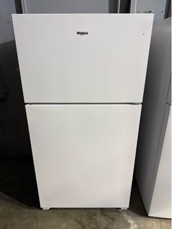 Brand new Whirlpool White top and bottom refrigerator