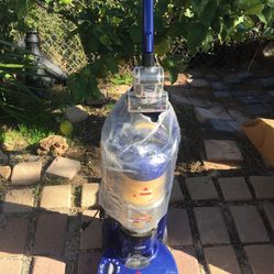 Like new Bissell vacuum with full attachments