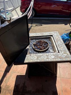 Fire pit, stone top with glass burning center decor
