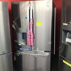 New Scratch And Dent GE 28 Cu Ft Stainless Steel French Door Fridge. 1 year Warranty 