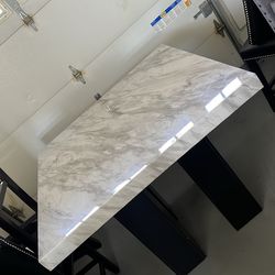 Marble table with black chairs, normal wear good condition