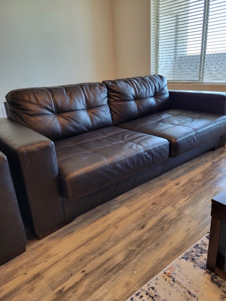 Leather Sofa And Arm Chair From Ashley's Furniture