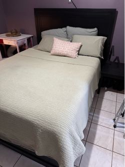 Queen size bed with wood frame