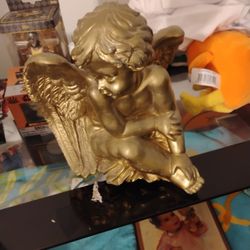 Gold And Statue 