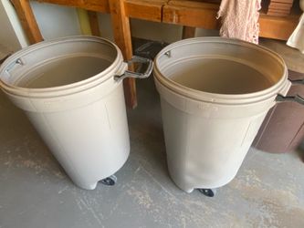 Rubbermaid large trash bins with wheels $5 each