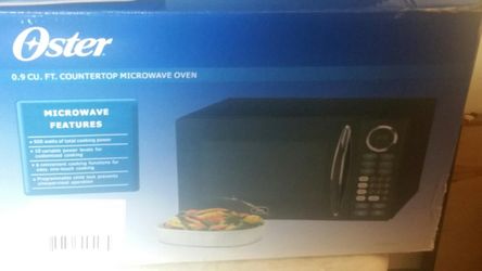 Microwave still in box.