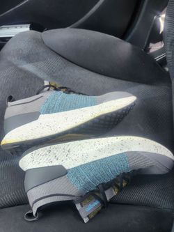 Used track sneakers