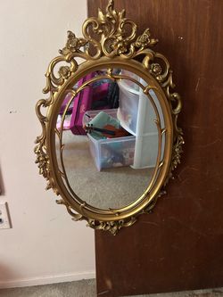 Vintage Syroco style ornate gold mirror