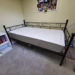 Metal day bed frame with single mattress