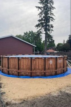 Coleman above ground swimming pool with sand filter and cover
