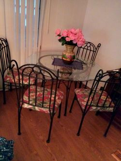 Reduced Over sized glass table wrought iron@4 chairs