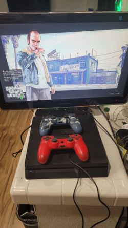 PLAYSTATION 4 SLIM 1TB 2 WIRELESS CONTROLLERS & GTA5 BUNDLE