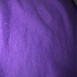 Three garbage bags full of upholstery fabric