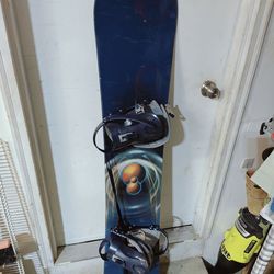 Burton  snowboard + size 10½ snowboard boots